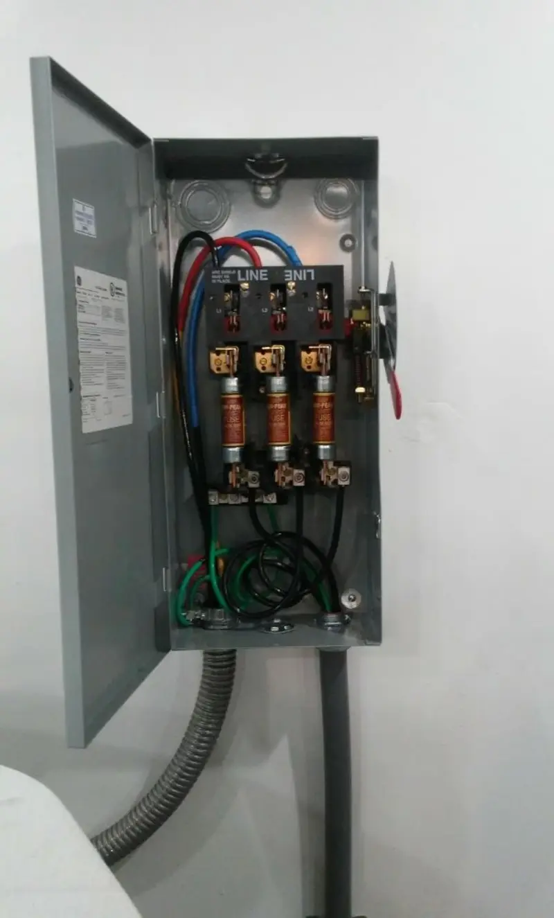 Three-phase disconnect switch installed for Smoke Detector Installation in Griswold